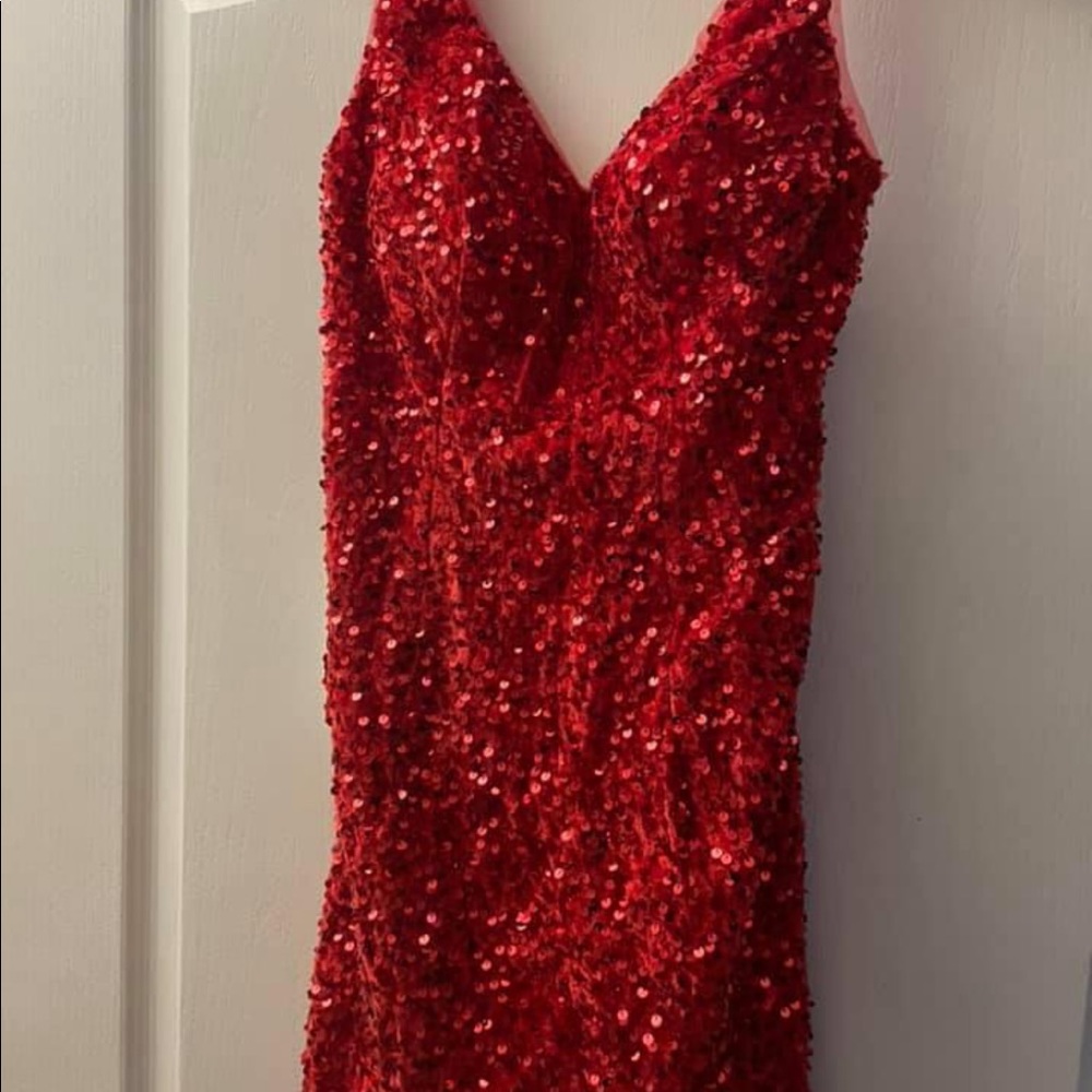 Brand new w/tags. Short, red sequin dress. Size small